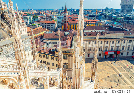 Top view from roof of famous Duomo di Milano Cathedral of White marble statues and Royal Palace Palazzo Reale 85801531