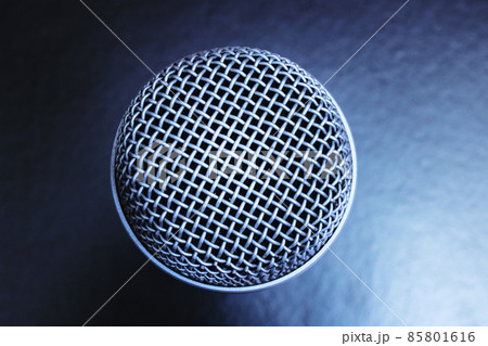 Microphone on black background top view closeup 85801616