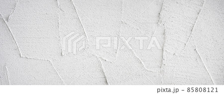 表面に凹凸のある白い壁の背景テクスチャー 85808121