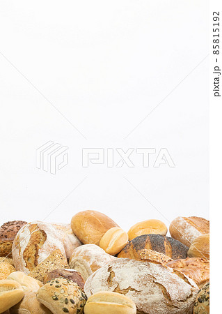 Many kinds and kinds of bread collected in one place as decoration for a traditional bakery. White background from the top for self-completion. Many kinds and kinds of bread collected in one place as decoration for a traditional bakery. White background from the top for self-completion. 85815192