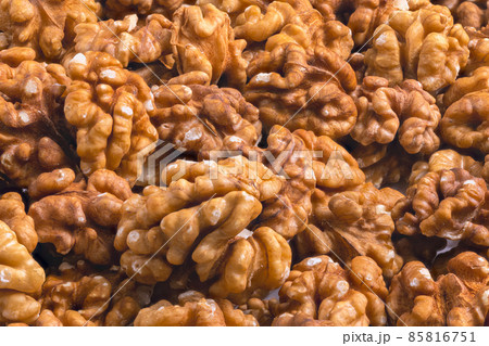 full frame close-up background of walnuts pile without shells 85816751