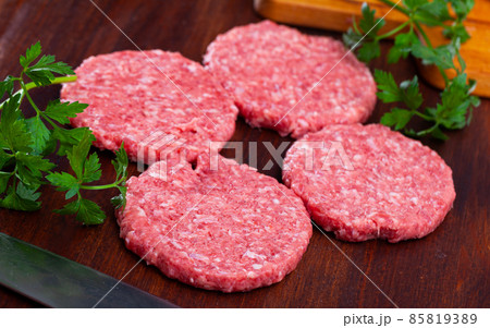 Cooking ingredients, raw burger cutlets Cooking ingredients, raw burger cutlets 85819389
