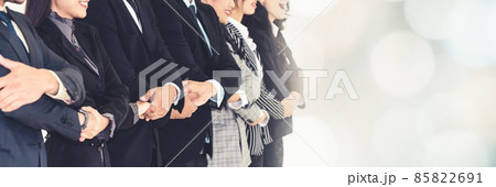Successful business people standing together broaden view Successful business people standing together broaden view 85822691