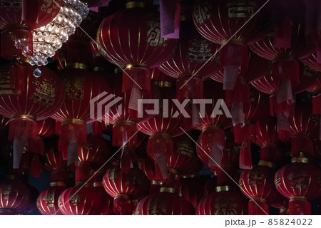 Many red Chinese lanterns in Interior at temple Many red Chinese lanterns in Interior at temple 85824022