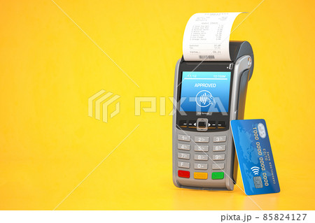 POS point of sale terminal for credit card payment on yellow background. 85824127