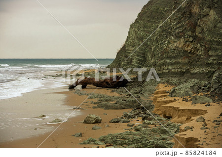Byala town beach with white rocks on a cloudy day, Bulgaria 85824184