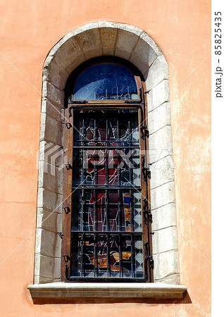Kamyanets Podilskyi, Ukraine: Saints Peter and Paul Cathedral also called Kamianets-Podilskyi Cathedral in the Old Town. Close up of a window. Kamyanets Podilskyi, Ukraine: Saints Peter and Paul Cathedral also called Kamianets-Podilskyi Cathedral in the Old Town. Close up of a window. 85825435