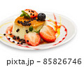 Delicious isolated caramel cupcake with strawberry and berries 85826746