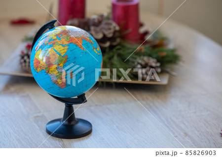 Toy globe on a wooden table Toy globe on a wooden table 85826903