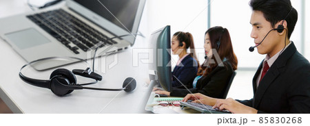 Business people wearing headset working in office in widen view 85830268