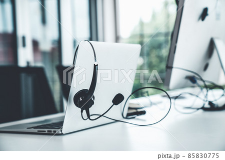 Headset and customer support equipment at call center ready for actively service 85830775