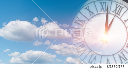 Double exposure of clock face in blue sky. Time passing concept. 85832573