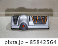 Modern electric knife sharpener in the home kitchen 85842564