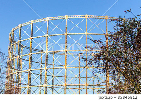 Disused Bradford Road gas holder seen from the Ashton Canal, Manchester, UK. Disused Bradford Road gas holder seen from the Ashton Canal, Manchester, UK. 85846812