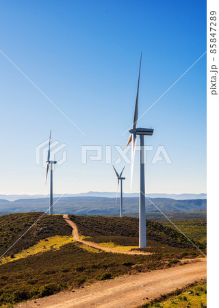 Turbines in a mountain wind farm. Ecological energy production. 85847289