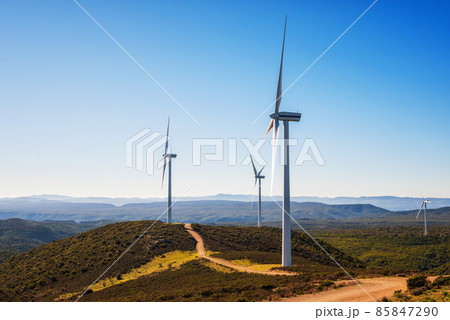 Turbines in a mountain wind farm. Ecological energy production. 85847290