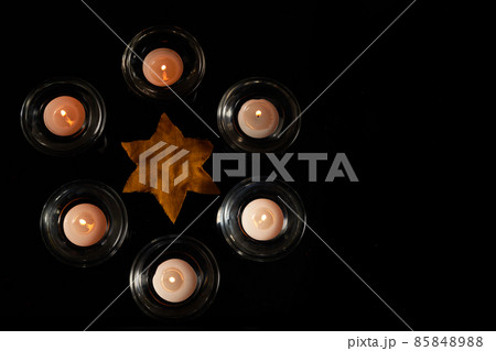 Burning candle on black background. Holocaust memory day 85848988