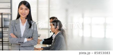 Business people wearing headset working in office broaden view 85853083