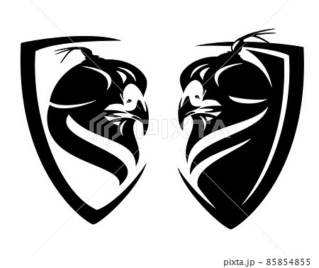 hunting falcon bird wearing hood in simple heraldic shield black and white vector emblem 85854855