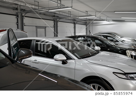 Different painted car drying in repair shop 85855974