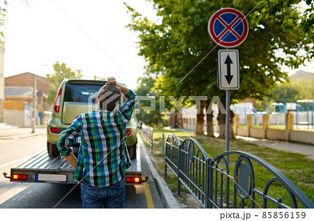 Worried driver having improper parking rule violation 85856159