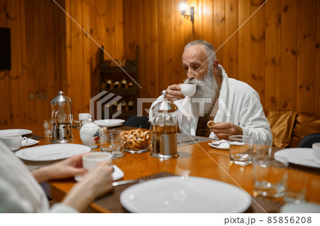 Senior man rest with friends in sauna 85856208