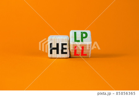 Hell or help symbol. Turned a wooden cube and changed the word 'hell' to 'help'. Beautiful orange table, orange background, copy space. Business, psychology and hell or help concept. Hell or help symbol. Turned a wooden cube and changed the word 'hell' to 'help'. Beautiful orange table, orange background, copy space. Business, psychology and hell or help concept. 85856365