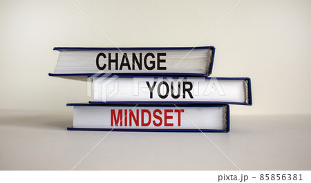 Books with text 'change your mindset' on beautiful white background. Business concept. Copy space. 85856381