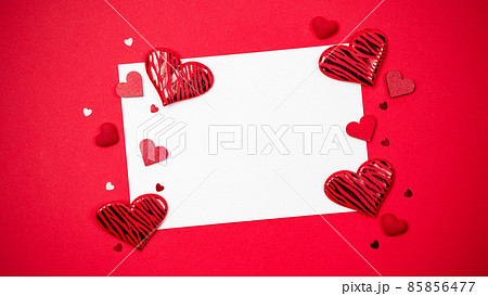 Valentines day heart. Red heart, romantic gift on love red with copy space. Valentine decoration for flat lay background. Valentines day heart. Red heart, romantic gift on love red with copy space. Valentine decoration for flat lay background. 85856477