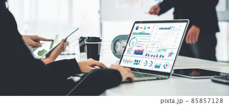 Businesswoman in business meeting using laptop computer proficiently at office 85857128