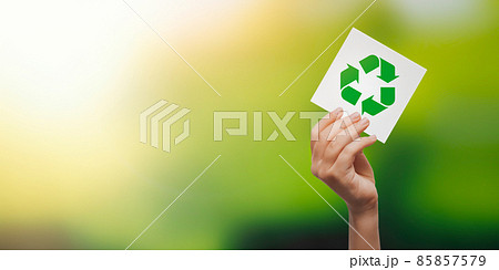Recycling symbol in hand. Ecology concept Recycling symbol in hand. Ecology concept 85857579