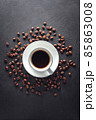 Coffe cup with saucer and beans 85863008