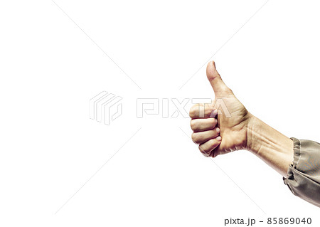 Hand showing thumb up sign against isolated on white background Hand showing thumb up sign against isolated on white background 85869040