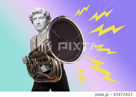 Abstract modern collage. The man with the plaster head of David holding the tube and play music 85872823