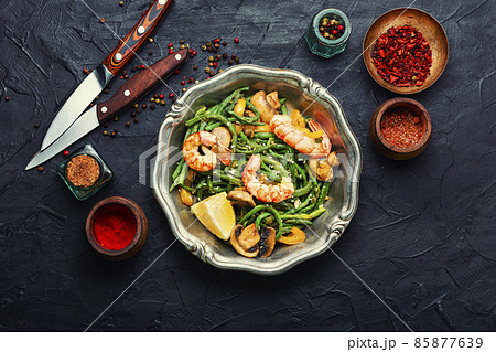 Tasty salad with seafood and vegetables. Tasty salad with seafood and vegetables. 85877639