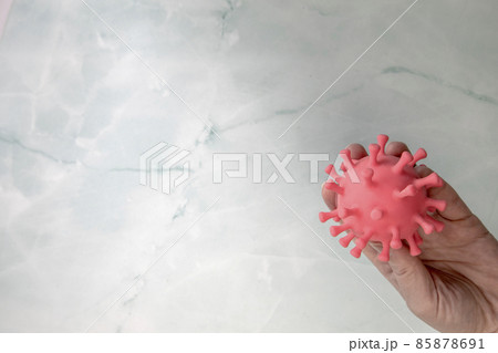 Hand holding Bacteria, virus top view with copy space. Covid-19,coronavirus medical health concept Hand holding Bacteria, virus top view with copy space. Covid-19,coronavirus medical health concept 85878691