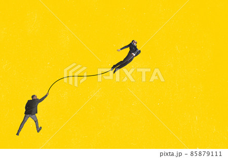 Contemporary art collage. Man holding one flying businessman symbolizing new ideas, motivation and growth Contemporary art collage. Man holding one flying businessman symbolizing new ideas, motivation and growth 85879111