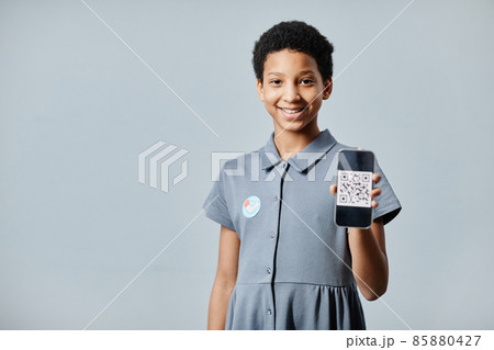Vaccinated Child Holding QR Code Vaccinated Child Holding QR Code 85880427