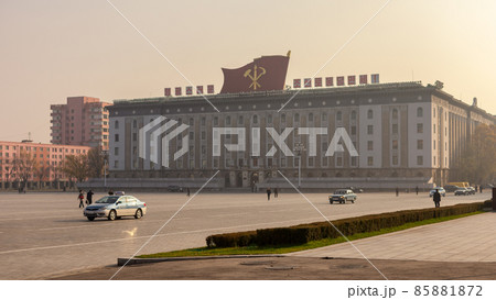 Kim Il-sung Square and government buildings decorated with flags and revolutionary slogans in Pyongyang, North Korea Kim Il-sung Square and government buildings decorated with flags and revolutionary slogans in Pyongyang, North Korea 85881872