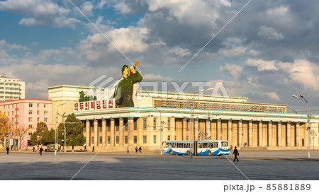 Kim Il-sung Square and government buildings decorated with flags and revolutionary slogans in Pyongyang, North Korea 85881889