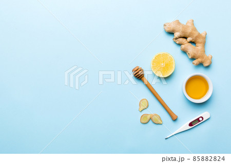 Natural cold and flu home remedies. Natural ingredients for immunity stimulation and viruses protection. top view flat lay Natural cold and flu home remedies. Natural ingredients for immunity stimulation and viruses protection. top view flat lay 85882824