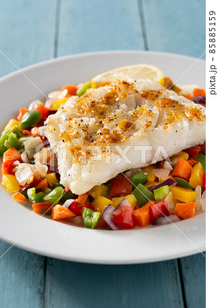 Grilled cod with vegetables 85885159