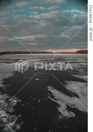 Winter sunset. Frozen Lake. Blue sky. Beautiful melancholy nature. Winter sunset. Frozen Lake. Blue sky. Beautiful melancholy nature. 85887452