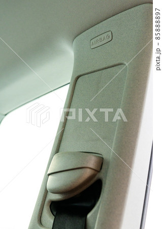 airbag in car interior near seat belt close-up 85888897
