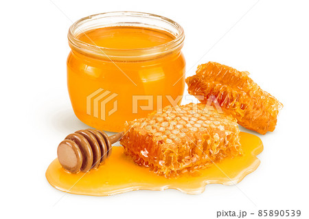 Honeycombs and honey puddle isolated on white background with clipping path and full depth of field 85890539