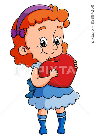 The cute girl is hugging a heart doll with the bright color 85894200