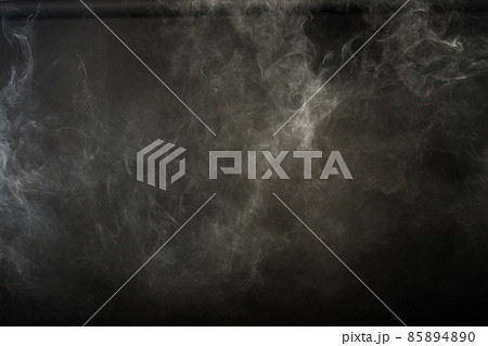 Dense Fluffy Puffs of White Smoke and Fog on Black Background, Abstract Smoke Clouds Dense Fluffy Puffs of White Smoke and Fog on Black Background, Abstract Smoke Clouds 85894890