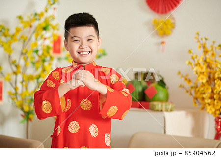 Boy Making Greeting Gesture 85904562