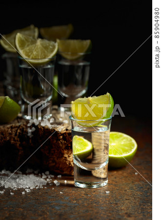 Tequila shots with lime and salt. Tequila shots with lime and salt. 85904980