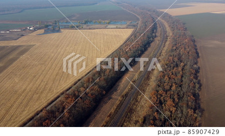 Panoramic Landscape View of Railway, Trees, Agricultural Fields, Lakes on Sunny 85907429